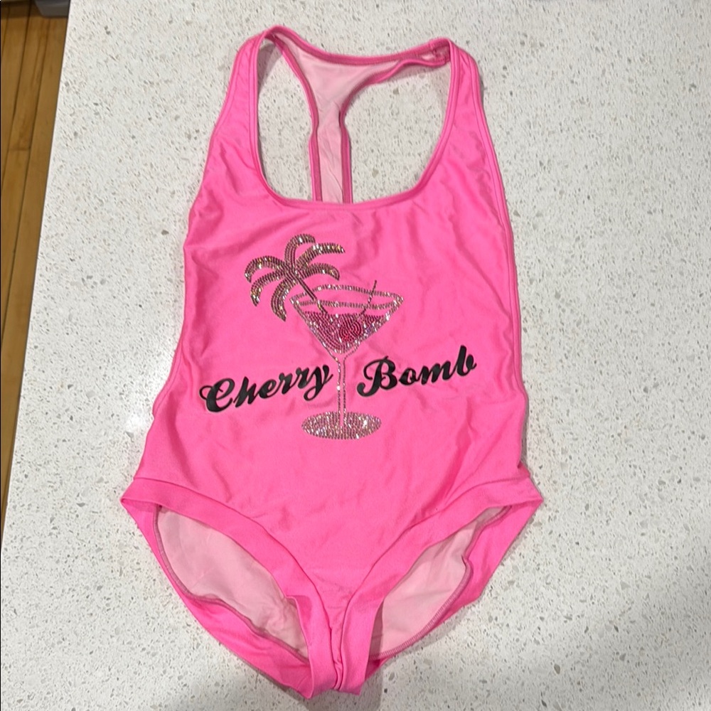 Pink Swimsuit with Cherry Bomb Design